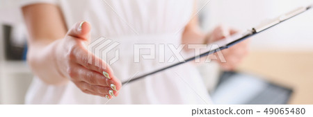 Business woman offer hand to shake as hello Business woman offer hand to shake as hello 49065480