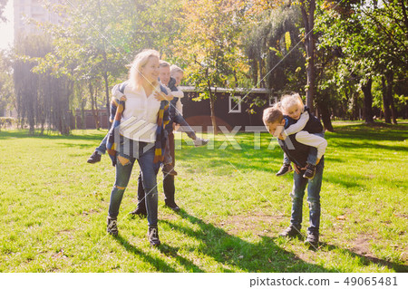 Theme family active leisure outside in nature. large Caucasian family with four children. Mom and 49065481