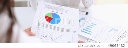Businesswoman holding a silvery pen 49065482