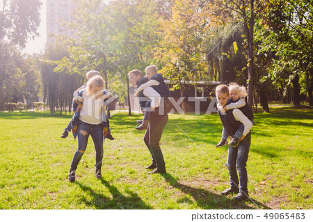 Theme family active leisure outside in nature. large Caucasian family with four children. Mom and Theme family active leisure outside in nature. large Caucasian family with four children. Mom and 49065483