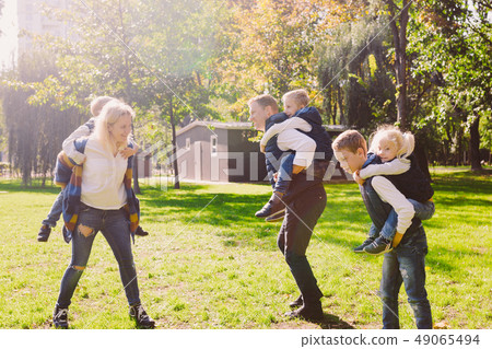 Theme family active leisure outside in nature. large Caucasian family with four children. Mom and Theme family active leisure outside in nature. large Caucasian family with four children. Mom and 49065494