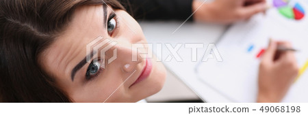 Beautiful smiling cheerful girl at workplace Beautiful smiling cheerful girl at workplace 49068198