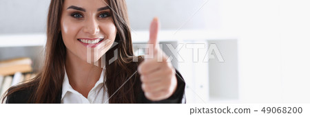 Beautiful smiling woman showing ok or approval Beautiful smiling woman showing ok or approval 49068200