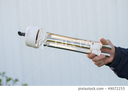 hand holds the measuring device for weather  49072255