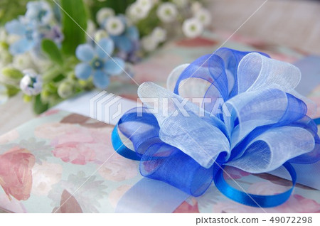 Father's Day Present Blue Ribbon and Blue Flower 49072298