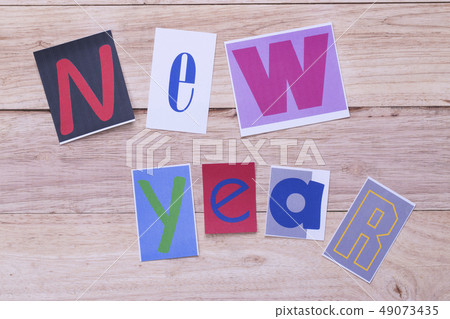 Word New year placed from colourful on the wooden  49073435
