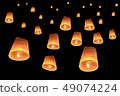 vector of floating lanterns on black background 49074224