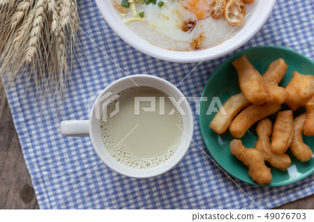 Breakfase meal. Congee or Rice porridge minced 49076703