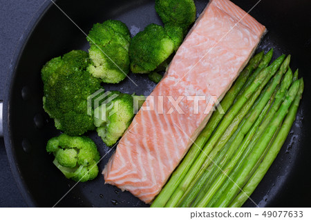 salmon with broccoli and asparagus salmon with broccoli and asparagus 49077633