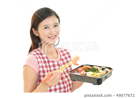 Housewife who enjoys cooking Housewife who enjoys cooking 49077672