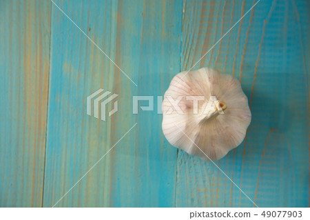 Garlic bulb on the wooden vintage background 49077903