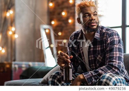 Nice good looking man enjoying his beer 49079236