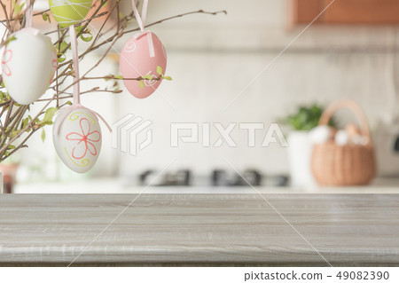 Easter. Blurred kitchen and wooden tabletop. Easter. Blurred kitchen and wooden tabletop. 49082390