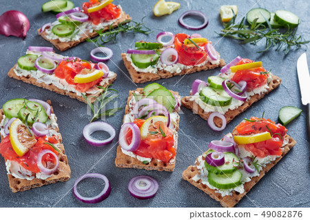 Crispbread red fish open toasts with cheese 49082876