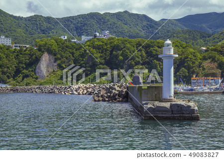 Utoro Harbor lighthouse summer view Utoro Harbor lighthouse summer view 49083827