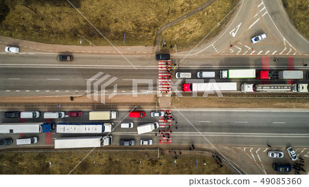Strike and protest of people. Blocked the road. Crowd of annoyed protesters blocking road with 49085360