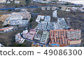Top view of a coast. The buildings of the island 49086300