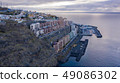 Top view of a coast. The buildings of the island 49086302