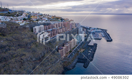 Top view of a coast. The buildings of the island Top view of a coast. The buildings of the island 49086302