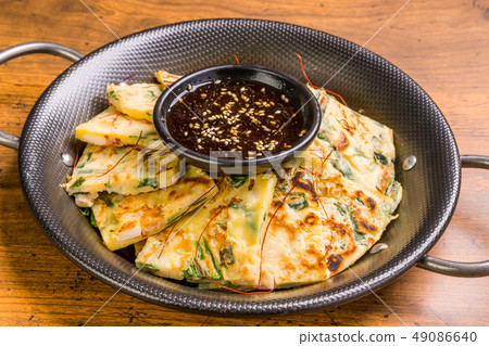 Chijimi Korean gourmet Asian Okonomiyaki jijim and iron pan Korean food Chijimi Korean gourmet Asian Okonomiyaki jijim and iron pan Korean food 49086640