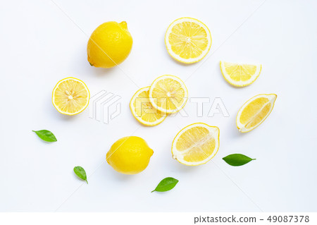 Lemon and slices with leaves isolated on white. 49087378