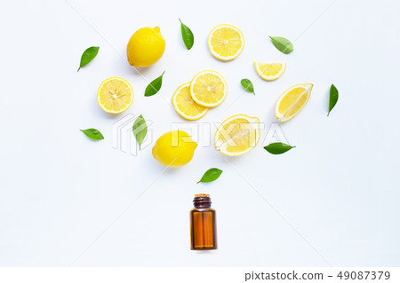 Lemon and slices with essential oil isolated on Lemon and slices with essential oil isolated on 49087379
