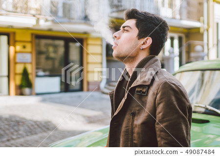 Portrait of a model young handsome sexy male brunette guy with dark skin Turkish Middle Eastern 49087484