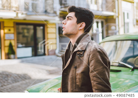 Portrait of a model young handsome sexy male brunette guy with dark skin Turkish Middle Eastern Portrait of a model young handsome sexy male brunette guy with dark skin Turkish Middle Eastern 49087485