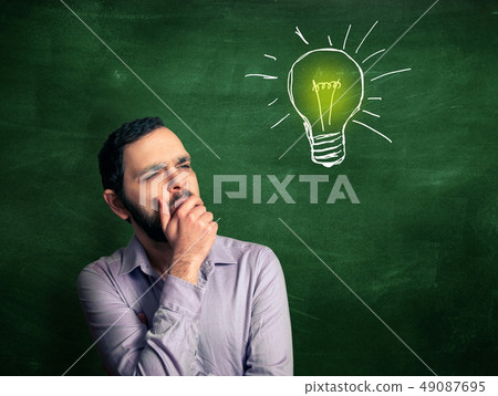 Bearded man on chalkboard background 49087695