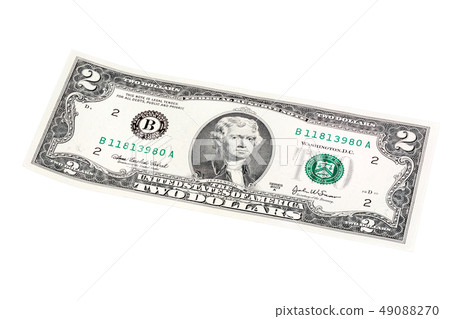 Made an angle end stacked shot of lucky 2 dollar bill. High resolution photo. 49088270