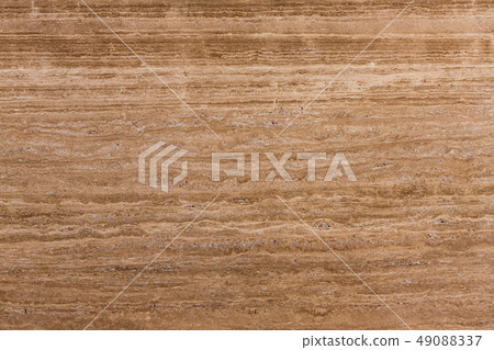 Travertine gold. Pattern of natural origin on the surface of the stone, close-up. Travertine gold. Pattern of natural origin on the surface of the stone, close-up. 49088337