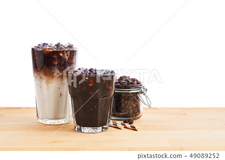 Iced coffee and latte macchiato in tall glass Iced coffee and latte macchiato in tall glass 49089252