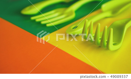 Set of green garden tools on green and yellow background 49089337