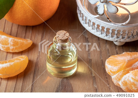 A bottle of tangerine essential oil  49091025
