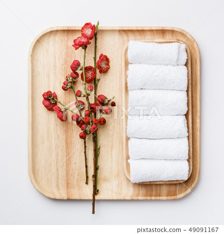 Spa treatment concept, flat lay composition with towels and flowers 49091167