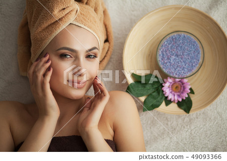 Face Massage. Close-up of a Young Woman Getting Spa Treatment Face Massage. Close-up of a Young Woman Getting Spa Treatment 49093366