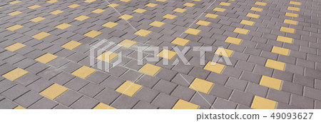 The cobblestones road in town square. Background The cobblestones road in town square. Background 49093627