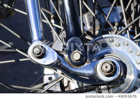 Fragment of chromed shiny wheel of old classic 49093676