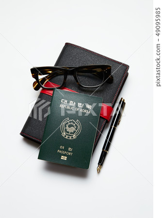 Passport, diary, fountain pen, glasses Passport, diary, fountain pen, glasses 49095985