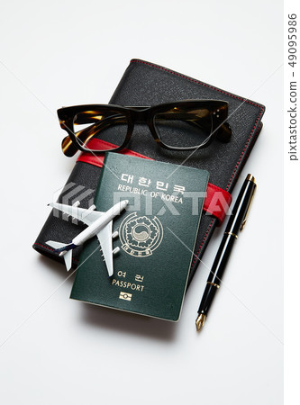 Passport, diary, fountain pen, glasses, airplane Passport, diary, fountain pen, glasses, airplane 49095986