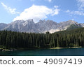 Lake Carezza and Dolomiti Massif and Forest 49097419