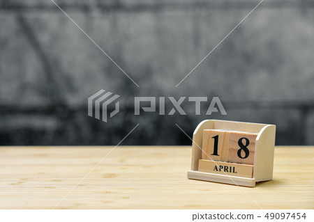 April 18 wooden calendar on vintage wood abstract April 18 wooden calendar on vintage wood abstract 49097454