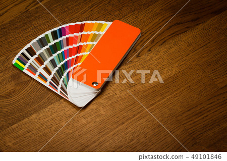 multicolor color paper sampler open on brown multicolor color paper sampler open on brown 49101846