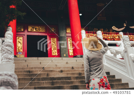traveling woman walk to a temple 49103781
