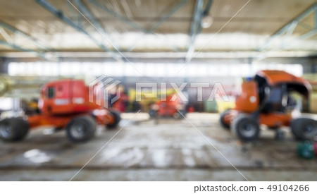 Construction machinery in garage as creative 49104266