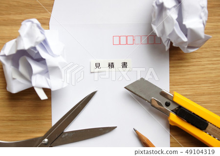 Quotations and office supplies such as pencils in an envelope Quotations and office supplies such as pencils in an envelope 49104319