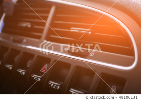 Car conditioner. The air flow inside the car. Detail interior. Air ducts, deflectors on the car Car conditioner. The air flow inside the car. Detail interior. Air ducts, deflectors on the car 49106131