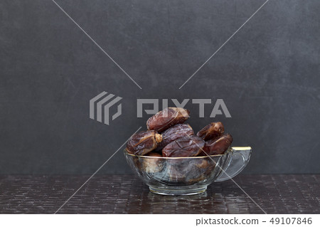 Ramadan kareem Dried date palm fruits 49107846