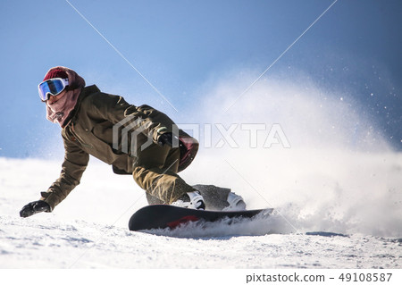 Female snowboarder 49108587