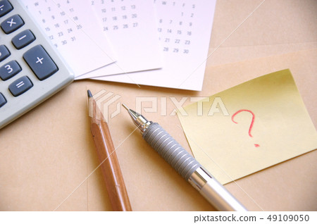 Calculator, calendar, pencil and pen and ending marks Calculator, calendar, pencil and pen and ending marks 49109050